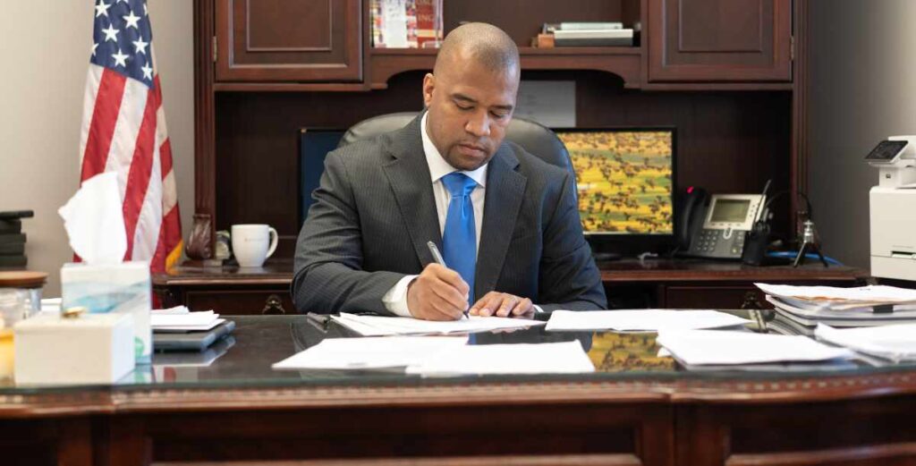 Hinds County District Attorney Jody Owens at desk